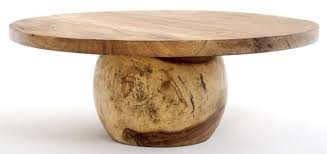 A Solid Round Wooden Base Supports A Thick Natural Slab Of Wood With A Beautiful Grain Pa Modern Wood Coffee Table Round Wood Coffee Table Rustic Coffee Tables