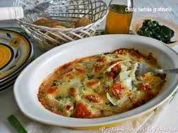 Preparazione delle bietole gratinate con besciamella. Coste Bietola Gratinate Ai Formaggi