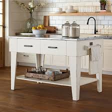 Portable kitchen islands or portable work centers are an excellent option for homeowners or people who live in small apartments who have small kitchens the material on the countertop of portable kitchen islands can be granite, stainless steel, or a butcher's block. Kitchen Islands For Your Dining Room Living Spaces