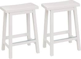 Amazon Com Amazon Basics Solid Wood Saddle Seat Kitchen Counter Height Stool Set Of 2 24 Inch Height White Home Kitchen