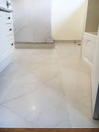 Its perfect to finish off my bathroom look. 24x48 Porcelain Tile Schluter Shower 3 Stone Tile Floor Bathroom Tile Floor Custom Tile Shower