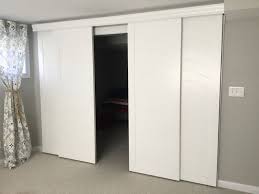 Bypass Sliding Barn Doors With Wood Valance To Cover A Closet Rather Than Bifold Closet Doors Fro Bifold Closet Doors Barn Doors Sliding Glass Doors Interior