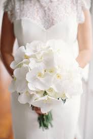 An Island Inspired Destination Wedding In Montego Bay Jamaica Orchid Bouquet Wedding Orchid Wedding Bridal Bouquet White Orchids