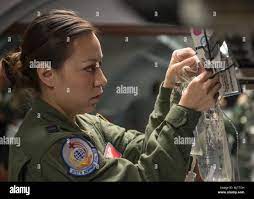 Capt. Crystal Love, 375Th Aeromedical Evacuation Squadron Executive Officer,  Prepares Fluid For A Simulation Inside Their Cargo Compartment Trainer,  Scott Air Force Base, Ill., Dec. 5, 2017. It's Designed To Provide Ae