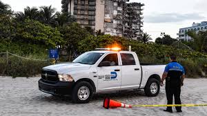 Loved ones await news, survivors flee after condo building partially collapses near. Yowdm8fpgkox2m