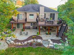 It typically sits at grade but can be raised if your property is on a slope. Patio And Deck Combinations Which To Do First Ideas And Pro Design Construction Tips