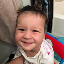 Amy shared sweet photos of her sons and herself sporting bright purple hair