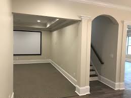 Lighter colors on the upper portion of a wall can add height to the wall, making the ceiling seem visually higher. Basement Renovations R R Of Lake Wylie Llc