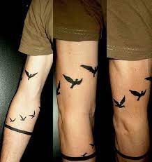 People choose lovebirds tattoos to represent their love because this bird not only signifies love and affection but also strength and lifetime commitment. 100 Small Bird Tattoos Design Ideas With Intricate Images Back Of Neck Tattoo Tattoos For Guys Small Tattoos For Guys