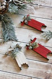 Celebrate the season with diy christmas ornaments & other holiday craft ideas. Handmade Christmas Ornaments Popsicle Stick Sleds Fun Christmas Crafts Christmas Crafts Christmas Vignettes