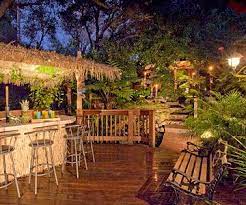 Create A Tropical Retreat In Your Backyard Backyard Backyard Beach Tiki Bar