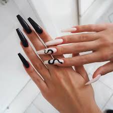 Acrylic nails — nail enhancements made by combining a liquid acrylic product with a powdered acrylic product — have a staying power in the beauty industry that's hard to beat. True Embellishments For Your Coffin Nails