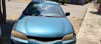 Computadora Ford láser 97 automático 04162229699 100$