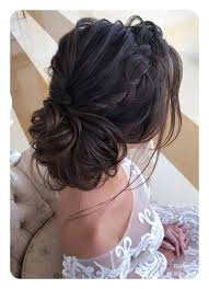 Her bronzed smoky eye made for a modern, polished look. 87 Easy Low Bun Hairstyles And Their Step By Step Tutorials Style Easily