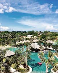 Movenpick Bali Is All About Sun Trees And Free Form Pool Places To Go Bali Baby Most Beautiful Places