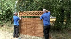 Lattice is great for growing creeping plants or blocking off your garden. How To Install A Fence Youtube
