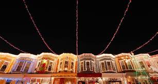 Christmas Lights Adorn The Row Houses On 34th Street In The Hampden Neighborhood O Best Christmas Lights Best Christmas Light Displays Christmas Light Displays
