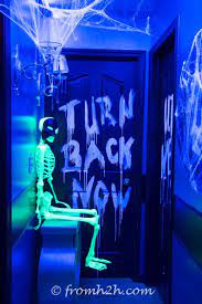 10 awesome glow in the dark decor ideas for halloween entertaining diva from house to home halloween entertaining spooky halloween decorations halloween house party