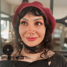 Converted a traditional philtrum piercing(medusa) into a vertical one! D is  rocking a titanium curved barbell, with a bead