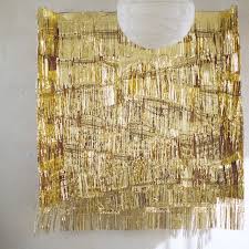 Backdrop Black And Gold Diy Party Decorations 10 Black White And Gold Diys For Your Gorgeous New Year S Party Porch Advice Fringe Backdrops Nye Party Decorations Diy Backdrop