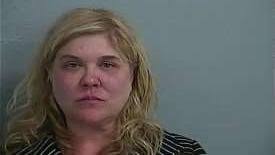 Woman charged with ramming into detective's vehicle