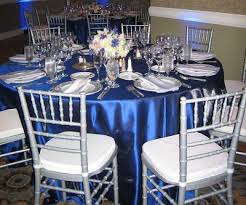 This dark and mysterious color scheme with a vibrant blue accent follows a prevailing web this bold and unique combination of royal blue and gold, with vivid cyan highlights. Royal Blue Chocolate Silver Project Wedding Wedding Table Decorations Blue Blue Table Decorations Blue Wedding Decorations