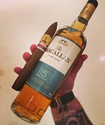 Tonight S Entertainment Is Provided By The Macallan With A Splendid 15yo Fine Oak My Friend Mr Bolivar With T Cigars And Whiskey Whisky Gold Peak Tea Bottle