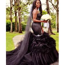 While most black dresses will project a slight so, if you're after a wedding dress with an air of fantasy, look for a design with elements such as thick lace, long sleeves, heavy fabrics or black brocade. Plus Size Black Wedding Dress Fashion Dresses