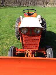 Image result for Orange Red 1972 Tractor