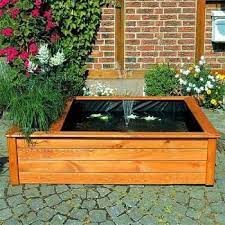 verhoogde vijverbak met fontein en plantenbak achtertuin vijvers vijver ideeen vijvers