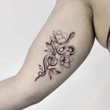 Snake And Magnolias Tattoo In 2021 Magnolia Tattoo Tattoos Hip Tattoos