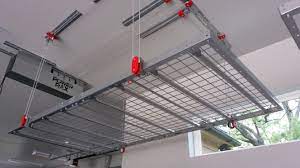 In addition to individual components, we offer garage door hardware kits that contain numerous parts and detailed instructions so it's easy to diy. Close Up View Of Our 4 X 8 500 Lb Capacity Motorized Storage Platform Garage Ceiling Storage Ceiling Storage Garage Storage