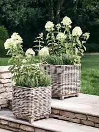 Check spelling or type a new query. Two Square Rattan Planters