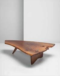 Finished to a smooth surface, each cross section displays beautiful grain and rich surface detail. George Nakashima Design London September 2008 Phillips