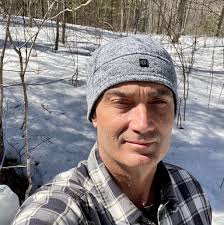 Should I use a disc chisel or disc ripper for primary tillage in the spring  in Michigan?