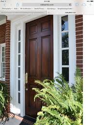 Stained Front Door With Red Brick Brick Exterior House Brick House Exterior Colors Traditional Front Doors