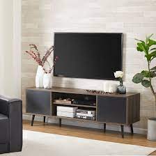 Flat panel television on modern tv stand. George Oliver Tarra Tv Stand For Tvs Up To 65 Reviews Wayfair
