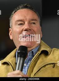 Mount Pleasant, Wisconsin, USA. 5th Sep, 2021. ROY DAVIS, 80, a U.S. Army  veteran, is shown Sunday September 5, 2021 with a sign he paid about $2500  to have made, expressing his