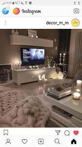 جدار رمادي مكتبة بيضاء باركيه فاتح اصفر home room design living room designs small bedroom decor