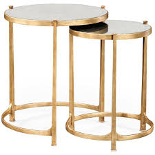 Their grey gunmetal metal tray tops and golden basket bases make a stylish, modern addition to your living room. Jonathan Charles Eglomise And Iron Round Nest Of Two Tables Gold Nesting Coffee Table Gold Nesting Tables Side Table
