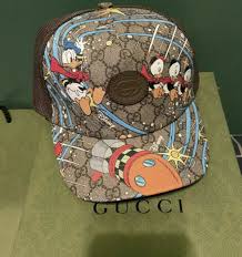 Gucci accessories know how to make an impression without over doing it and a gucci bucket hat or baseball cap can turn throwing a hat on to a whole new style level. Gucci X Disney Duck Tales Hat Baseball Cap 2020 Collection New Authentic