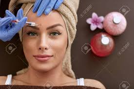 Katherine neer you see advertis. Beauty Woman Giving Botox Injections Botox Cosmetic Treatments Wrinkle Removal Botox Injections Stock Photo Picture And Royalty Free Image Image 62524631