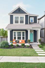 Check out these stunning houses of all styles with exterior shutters (black, red, blue, green and gray examples). 27 Exterior Color Combinations For Inviting Curb Appeal Better Homes Gardens