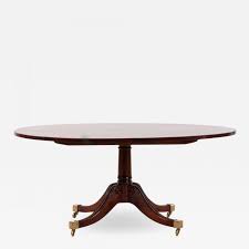 English coffee table chesterfield table, circa 1900 solid wood, rectangular frame. English Sheraton Style Oval Mahogany Saber Leg Coffee Table