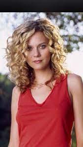 This Is The Collarbone Length And Face Framing Layered Haircut That I Want Today Medium Curly Hair Styles Curly Hair Styles Medium Hair Styles