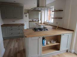 What colour worktop with light grey units. Tewkesbury Skye With Solid Oak Worktops Howdens Kitchen Design Kitchen Inspirations Home Kitchens