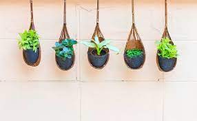 Create hanging miniature gardens in any small container you might have in your kitchen or attic or find at an antique shop. 70 Hanging Flower Planter Ideas Photos And Top 10 Hanging Flower Pots Flower Planters Hanging Plants