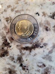 My first King Charles III, Canadian 🇨🇦 currency; a fancy new Tooney. Male  67, size 10. No bananas in the house.