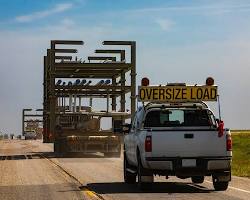 Image of car with various oversized loads