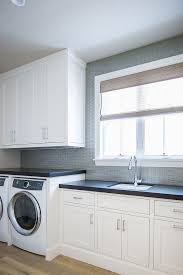 Dunn Edwards Carrara Semi Gloss Cabinet Paint Color Laundry Room White Cabinet Laundryroom Whitec California Beach House Coastal Interiors Home Decor Near Me